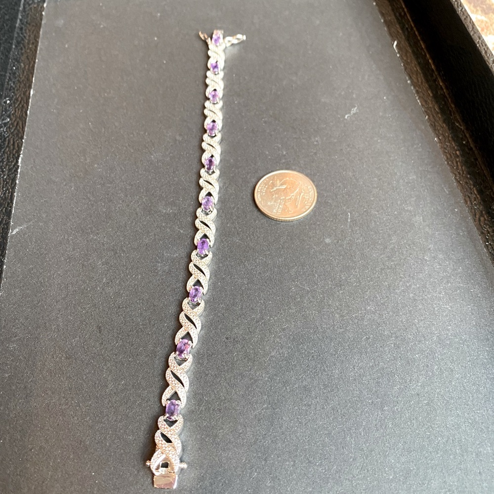 ** Genuine 7.5 ct amethyst and diamond accent bracelet